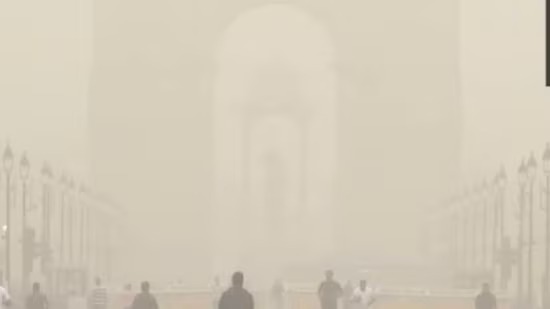 India Gate hidden behind a cloud of dust