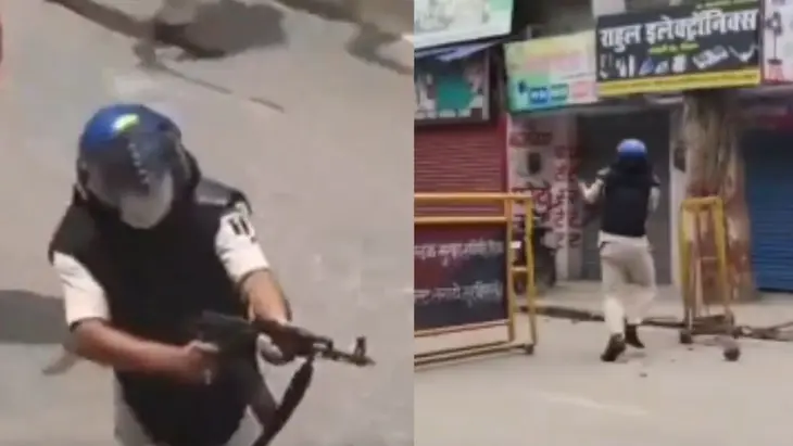Bihar Cop Suspended Over AK 47 during student protest