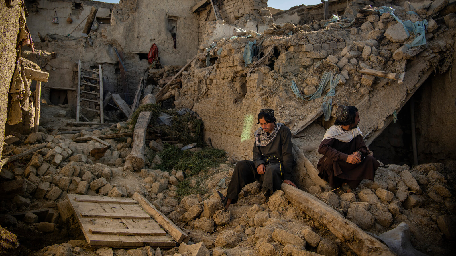 Afghan quake survivors search for families and prepare graves amid ruins