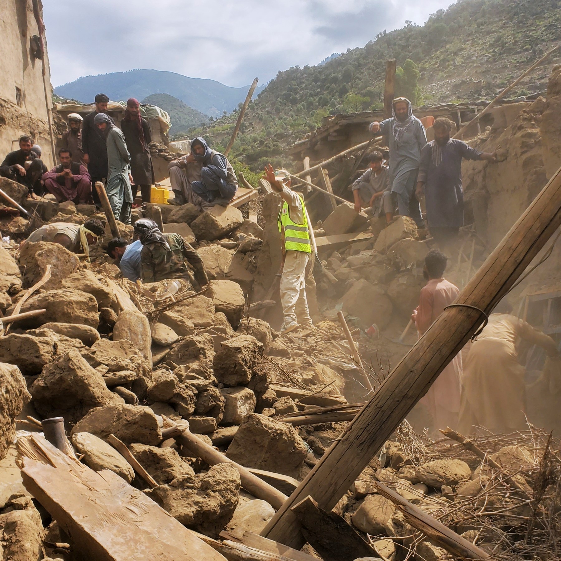 Survivors of Afghan quake stay away from villages over landslide threat