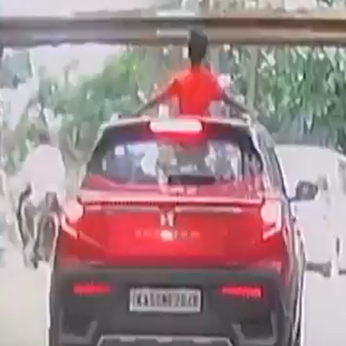 Bengaluru Car Sunroof Stunt Video Leads to Police Action, Driver Booked for Negligence
